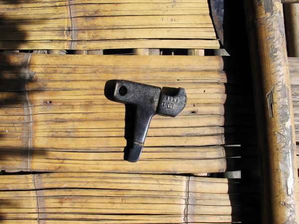 Machine part used as a makeshift hammer.