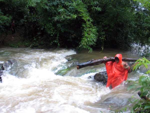 The Paluunq Stream at Mrka Từk Hamlet, swollen after a night of heavy rain. These conditions make hauling firewood harder work than usual.