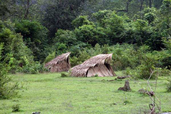 Birthing huts are constructed at ground level on the fringes of village lands. The mother is attended by midwives, and is not allowed to enter any raised house until after a period of ritual detoxification.