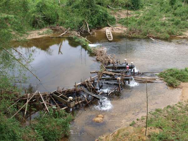 A battery of pico-hydro units at Mrka Kơn Hamlet. Each unit powers a home-interior lightbulb whenever needed.