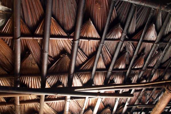 A central feature of Kri houses and field huts is a central fire pit, for cooking and warmth. The constant smoke quickly toasts the interior, coating it with soot.